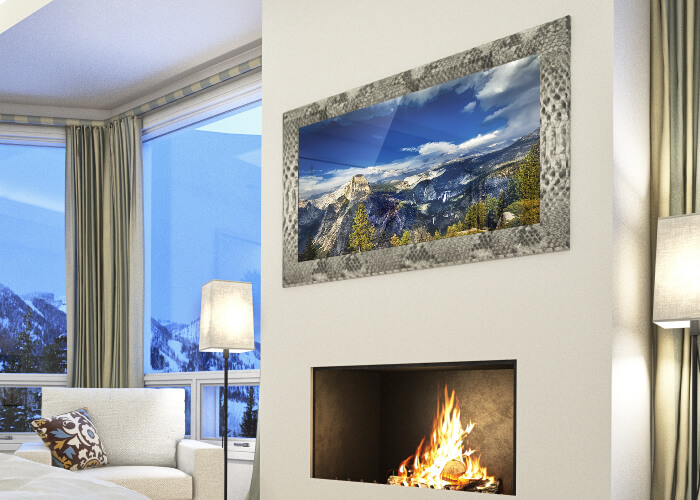 Crocodile skin leather tv frame, hanged on a white wall above a fireplace.